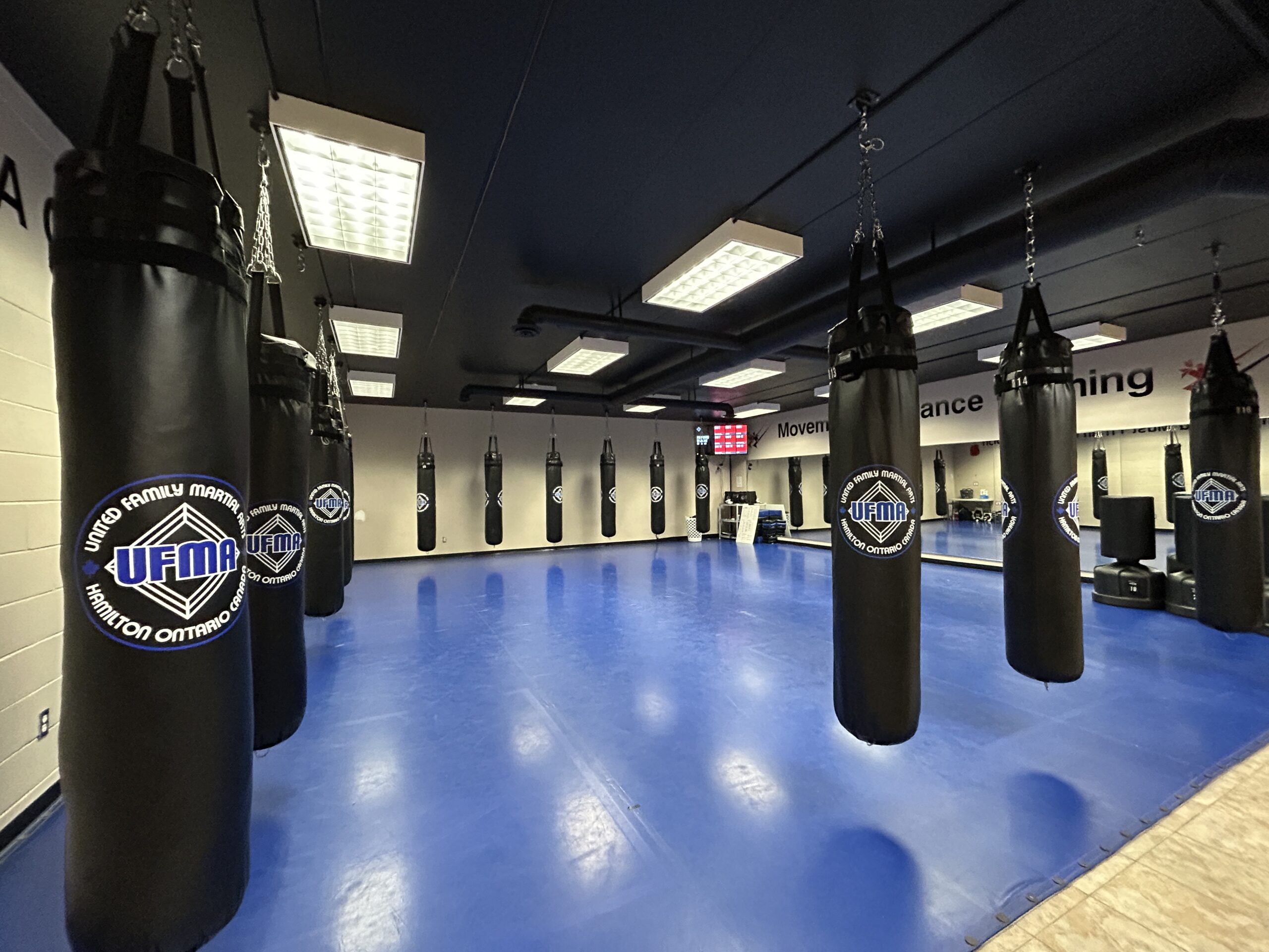 Kickboxing floor with hanging heavy bags