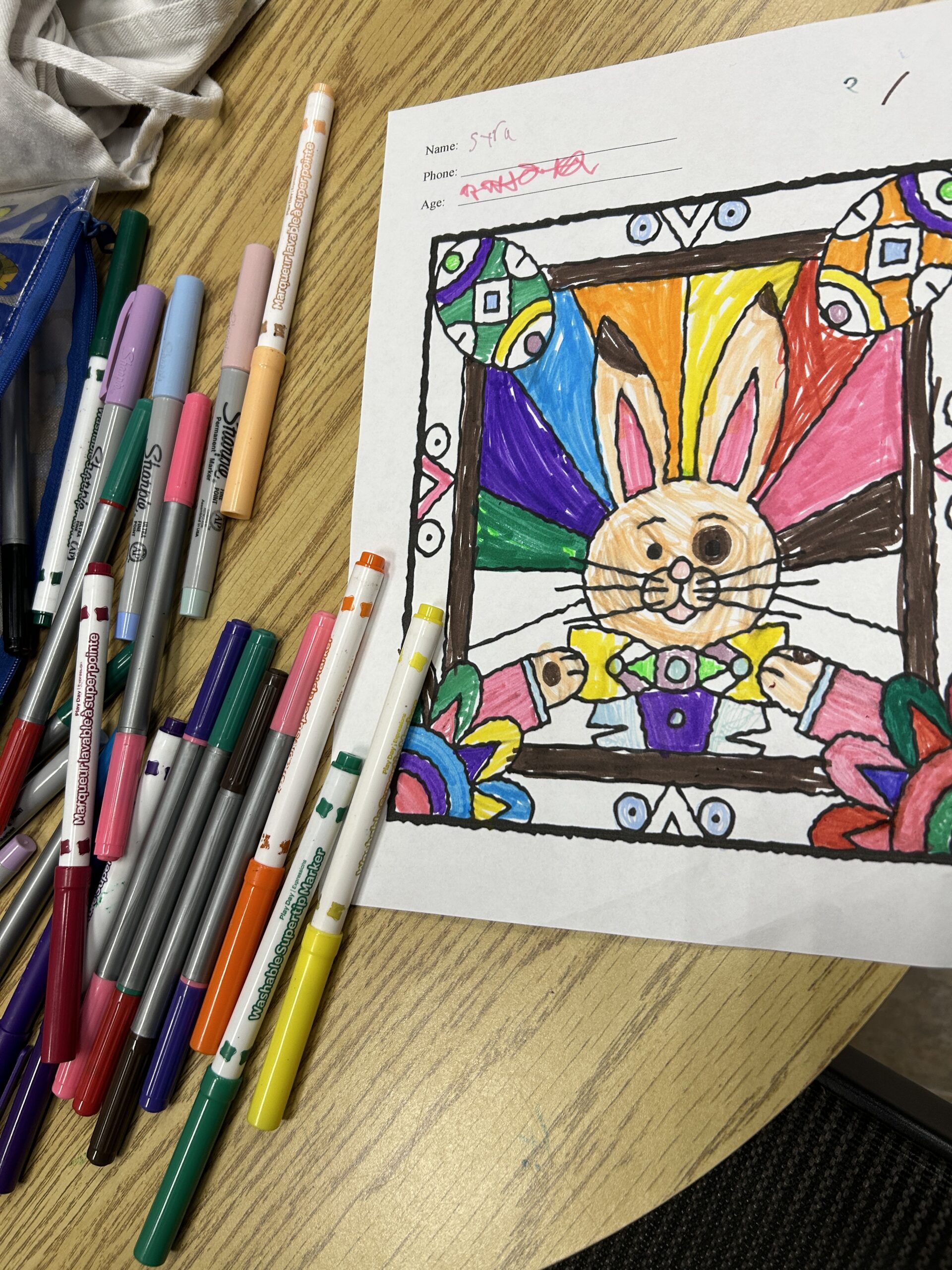 colouring sheet with bunny and markers
